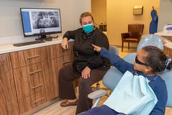girl pointing at xray